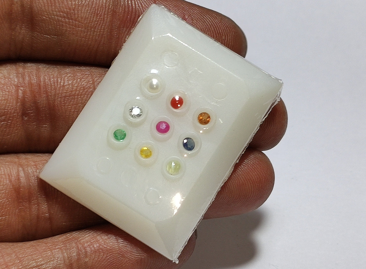 Navratan Gemstone for spiritual healing, energy balance, and positive vibrations #NavratanGemstone #HealingCrystals #SpiritualHealing #EnergyBalance #PositiveVibes #CrystalHealing #GemstoneJewelry #HolisticHealing #ChakraHealing #VastuDecor #DivineBlessings #HealingEnergy #NavratanJewelry