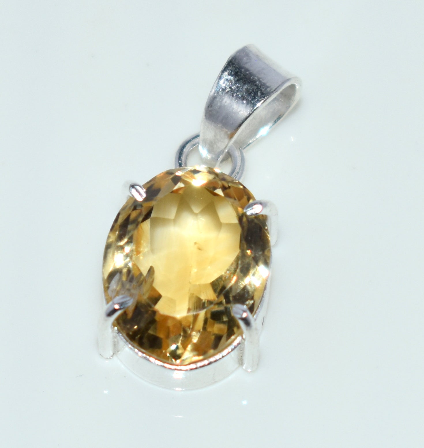 This 2.60-gram Citrine Oval Faceted Cut Pendant shines with vibrant golden hues #CitrinePendant #OvalFaceted #GemstoneJewelry 