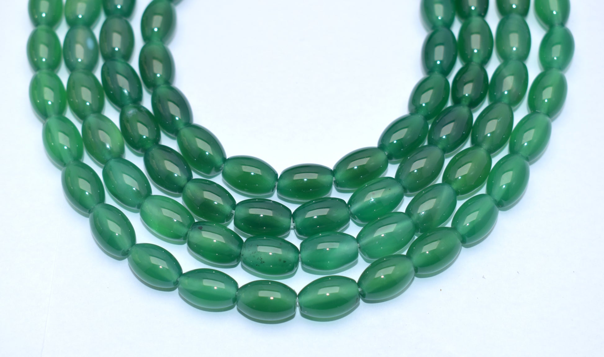 This beautiful strand features natural green onyx beads (8x12mm), perfect for adding elegance to your jewelry creations. #GreenOnyx #OnyxBeads #GemstoneJewelry #HealingCrystals #CrystalB eads #JewelryMaking #FashionJewelry

