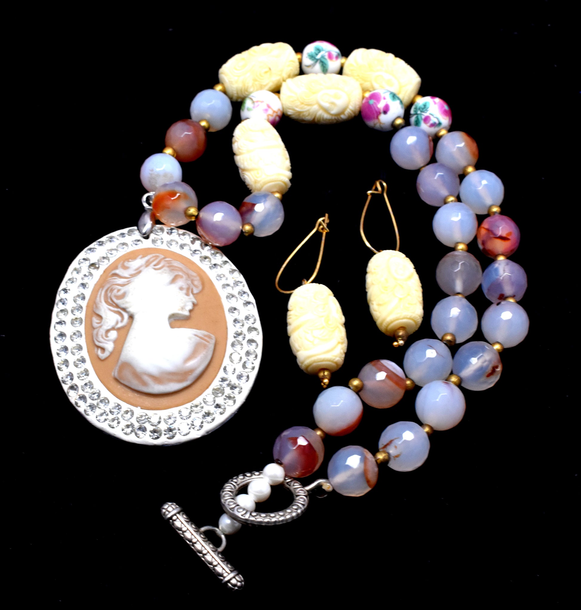 This stunning set features round faceted beads (10mm to 12x20mm) with a pendant necklace and matching earrings.
 #FacetedBeadSet #PendantNecklace #EarringSet #GemstoneJewelry #ElegantJewelry #FashionJewelry
